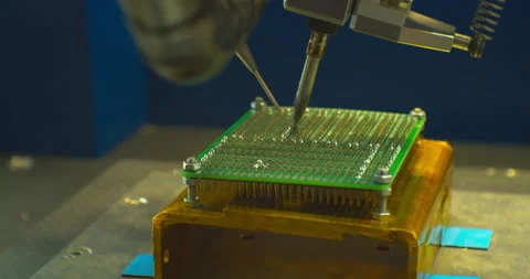 Industrial robot assembles an electronic board.Technological process of Stock Footage 152655150