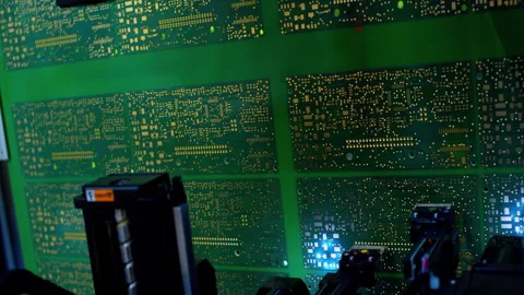 Industrial robot checks the assembly of elements on a circuit board Stock Footage 337414141