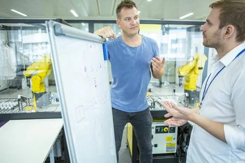 Industrial Robot Development Engineers in the development of the industria... 스톡 사진