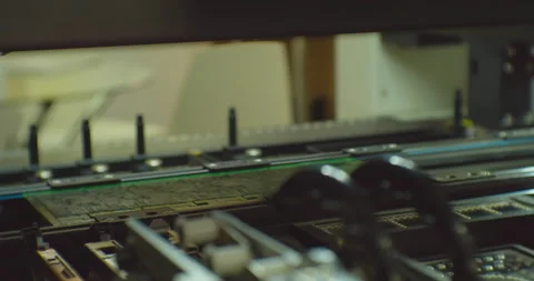 Industrial robot for electronics manufacturing makes a complex printed circuit Stock Footage 152667751