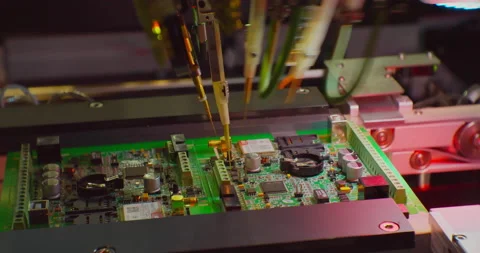 Industrial robot for electronics manufacturing makes a complex printed circuit Stock Footage 152740400