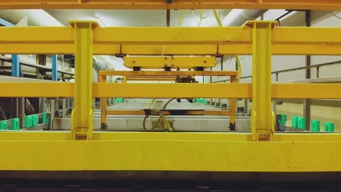 Industrial robot machine lifting panels Stock Footage 114510285