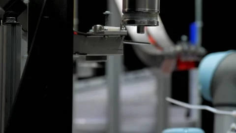Industrial robot at work in the factory of plastic products. Stock Footage 139903871