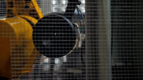 Industrial robot at work in the factory of plastic products. Stock Footage 140052967