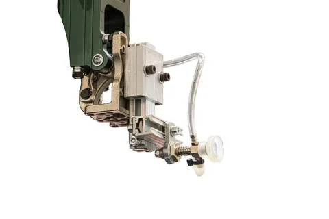 Industrial robotic arm end effector equipped with a vacuum suction cup system Stock Photos