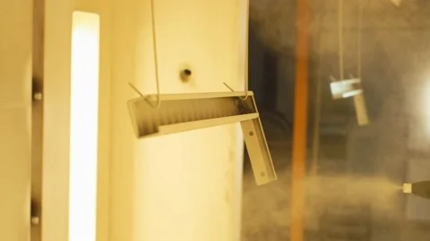 Industrial robotic sprayers move automatically when painting. Automated Stock Footage 201593473
