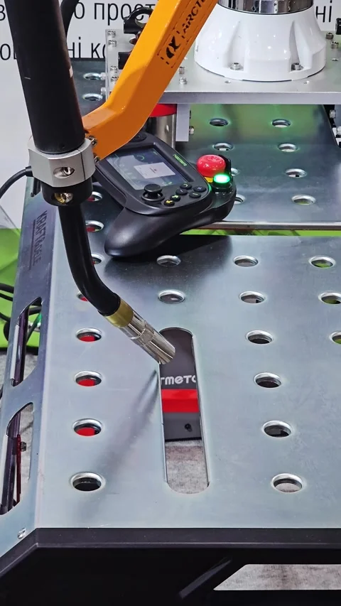 Industrial Robotic Welding Arm Demonstrating High Precision Automation Stock Footage 338381776