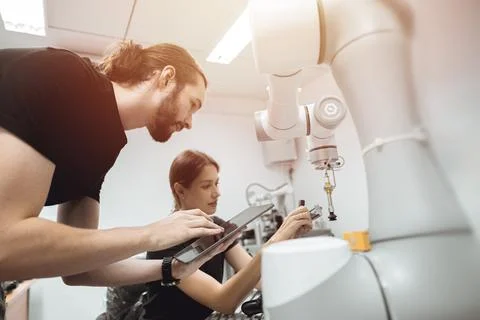 Industrial Robotics program university students learning education mechanic.. Foto stock