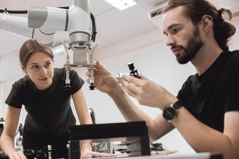 Industrial Robotics program university students learning education mechanic.. Foto stock