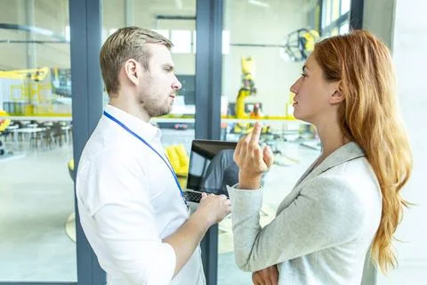 Industrial Robots Advice Engineers developing AI for industrial robots.  Stockfoto's