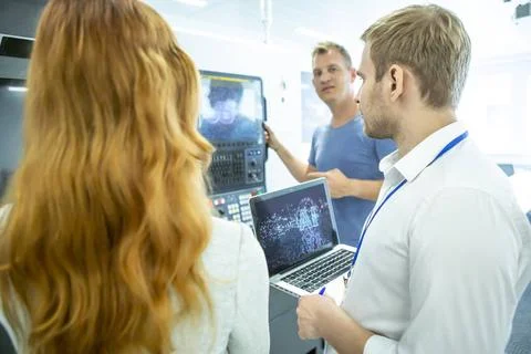 Industrial Robots AI Development Engineers developing AI for industrial ro... 스톡 사진
