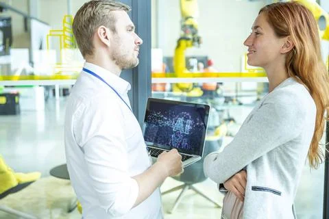 Industrial Robots AI Development Engineers developing AI for industrial ro... 스톡 사진