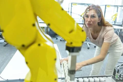 Industrial Robots Development An engineer developing the industrial robot.... Foto stock