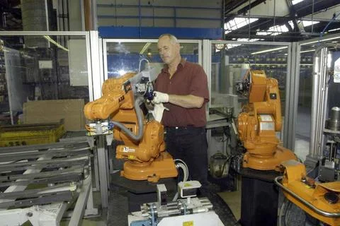  Industrial robots in use through artificial intelligence for the industry... Foto stock