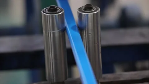 A industrial roller guide system blue structural profile maintain its path Stock Footage 328721794