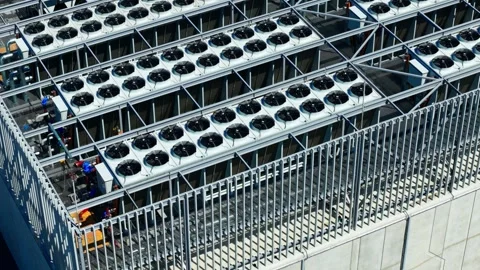 Industrial Rooftop Cooling Systems in Riga - Data Center Infrastructure Stock Footage 340596943