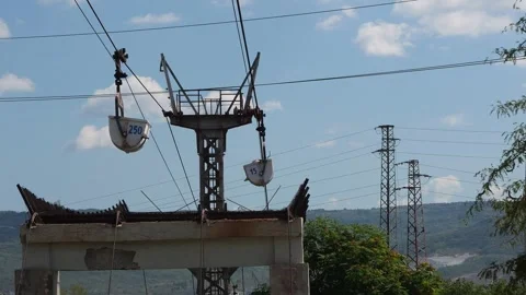 Industrial ropeway transporting materials in buckets Stock Footage 345927122