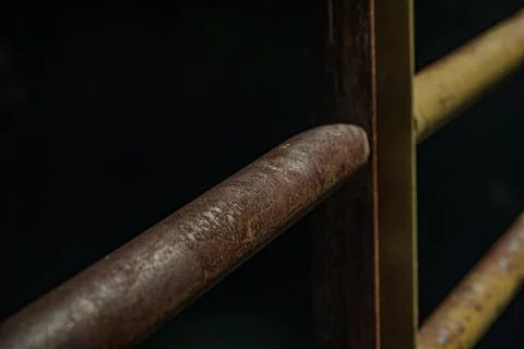 Industrial rust texture on iron railing steel structure near midnight Фото