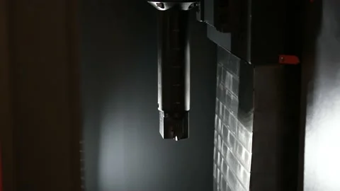 Industrial safety first concept, operator machining automotive parts by Stock Footage 148473475