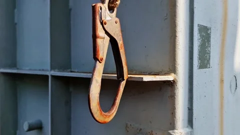 Industrial Safety Snap Hook with Rusty Texture on Steel Structure Background Stock-Footage 332448872