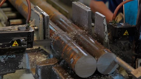 The industrial sawing machine cutting the material rod. The band saw machine 스톡 동영상 127557924