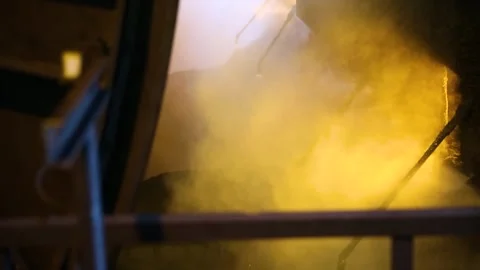 An Industrial Scene Featuring Stunning Light and Smoke Effects in a Creative Stock Footage 285962423