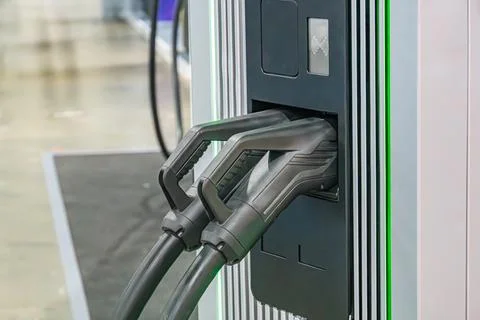 Industrial server or control unit with cooling fins, three black-connectored  Stockfoto's