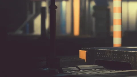 Industrial setting with focus on machinery and colorful elements Stock Footage 344827500