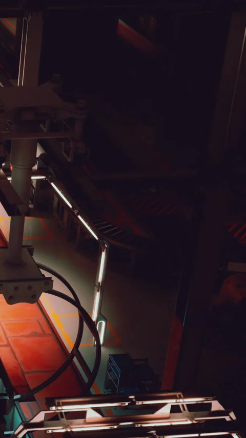 Industrial setting shows robotic arm working in a factory at night Stock Footage 339039819