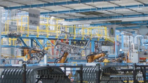 Industrial setup. Slow motion shot car factory production line. Car engine robot Video stock 90544237