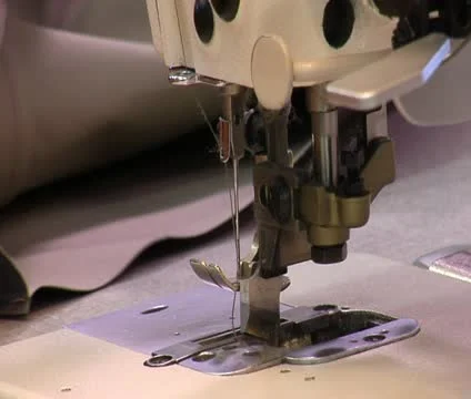 Industrial sewing machine in operation Video stock 21594042