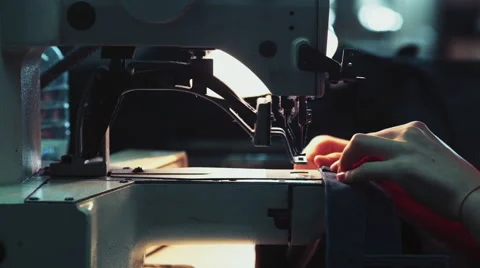 Industrial sewing machine in working process Stock Footage 54628488