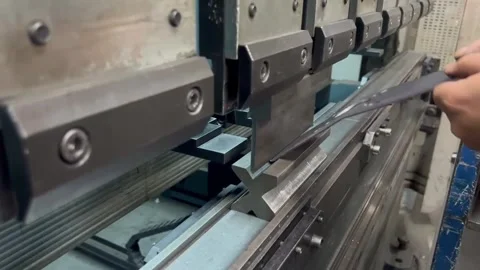Industrial Sheet Metal Bending Process in Factory Stock Footage 337058099