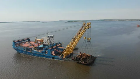 Industrial ship crane removed the old sunken ship from the river 스톡 동영상 132344843