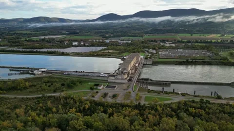 Industrial ship passing through the lock above the hydroelectric power plant Stock Footage 291935125