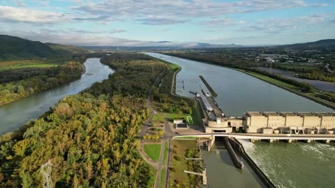 Industrial ship passing through the lock above the hydroelectric power plant Stock Footage 291935132