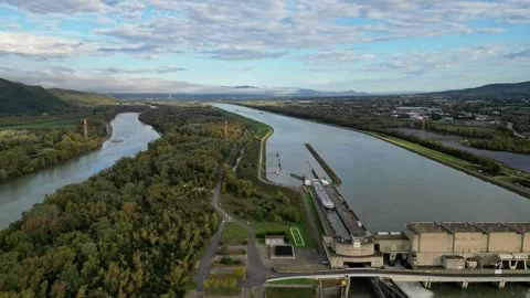 Industrial ship passing through the lock above the hydroelectric power plant Stock Footage 291935136