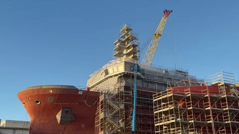 Industrial Ship Under Construction at Shipyard With Scaffolding Vidéo 323771926