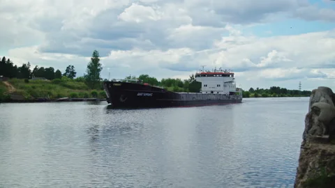 Industrial ship without cargo floats on the river Stock Footage 157732652