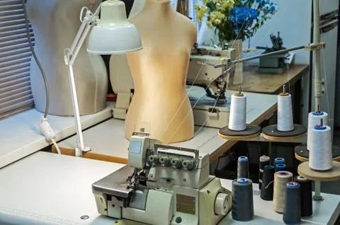 Industrial single-needle three-thread overlock with direct drive Stock Photos