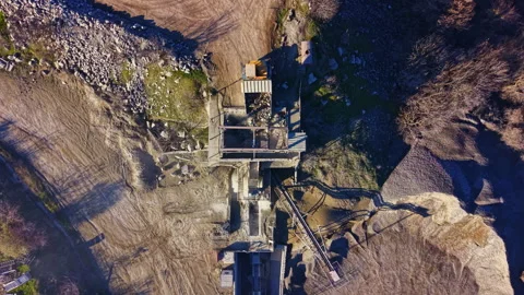 Industrial site captured from above, showcasing machinery and gravel processing Stock Footage 332027489