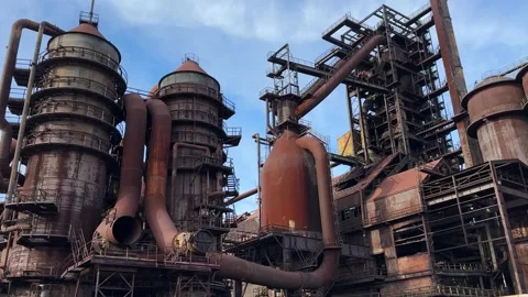 Industrial site with pipe rack and mechanical engineering machinery in Ostrava Stock Footage 265487573