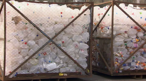 Industrial-sized recycle bins filled with plastic containers Stock Footage 59512918