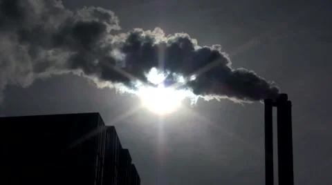 Industrial smokestack blocking out the sun 2 Stock Footage 40539268