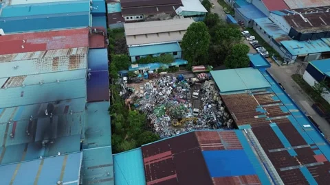Industrial sprawl and a colossal open-air waste dump reveal significant env.. Video stock 339035932