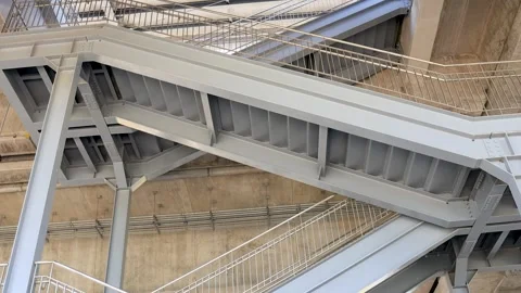 Industrial steel staircase structure inside modern building with concrete Stock Footage 330658628