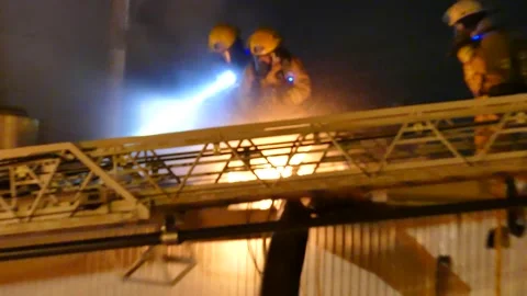 Industrial structure on fire Stock Footage 139663821