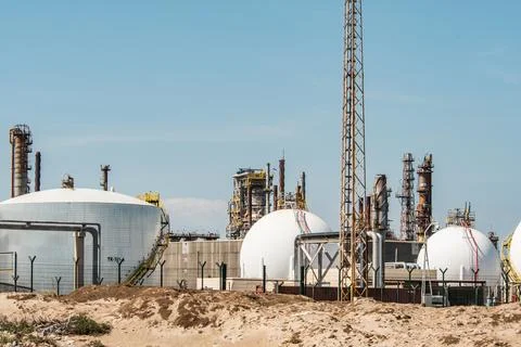 Industrial structures, structures, storage tanks at the Oil Refinery Photos