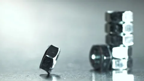 Industrial style macro image of threaded nut and reflection Filmed on a high Stock Footage 335413654
