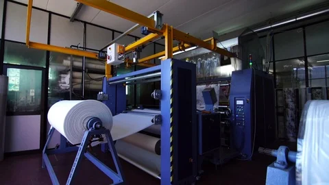 Industrial sublimation printer for digital printing on fabrics. Modern textile i Stockbeeldmateriaal 105382757